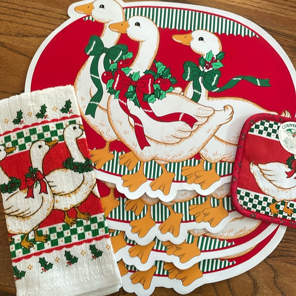 4 Retro duck placemats, dish towel, and potholder.